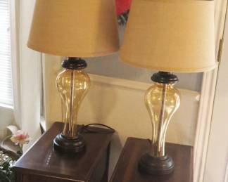 Canvas art, amber glass lamps, side tables