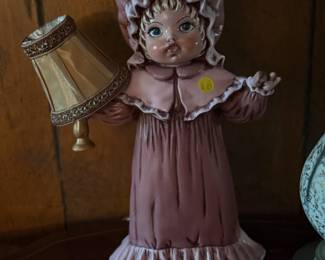 Vintage lamp with porcelain doll holding light with shade 
