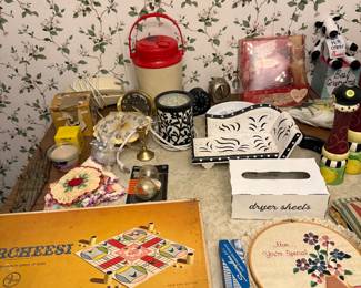 Assorted kitchen decorations and vintage board games