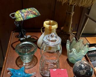 Assorted nick nacks on vintage cherry side table 