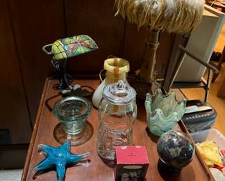 Assorted unique items on cherry side table 
