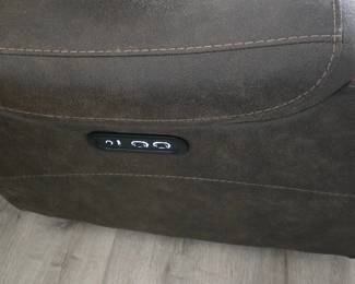 Both on couch and chair (1 touch close, headrest tilt switch, auto recline switch)
