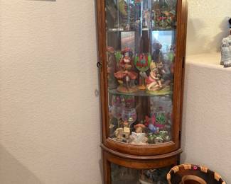 curved glass curio cabinet