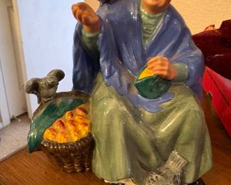 Royal Doulton figurine titled "The Old Balloon Seller" 
