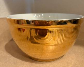 vintage Hall China "Golden Glo" piece, likely a casserole dish, bowl, or similar oven-proof item, featuring a 22K gold glaze. 