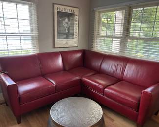 Stunning leather sofa from Beidleman’s Furniture measure is 83 inches from corner to end on each side comes apart in two pieces for convenient moving