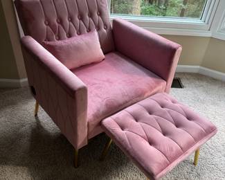 Upholstered pink chair