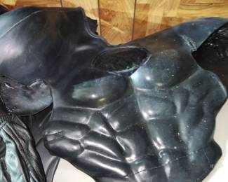 The homeowners are the parents of a Baltimore man who dressed as Batman and did charity work in costume.  These are some of  his authentic Batman costumes.