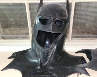 The homeowners are the parents of a Baltimore man who dressed as Batman and did charity work in costume.  These are some of  his authentic Batman costumes.
