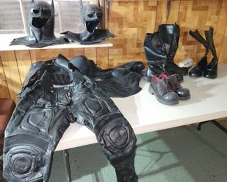 The homeowners are the parents of a Baltimore man who dressed as Batman and did charity work in costume.  These are some of  his authentic Batman costumes.