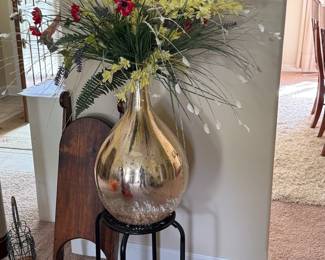 Large flower arrangement on stand, wooden sled