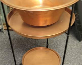 Copper and iron table with copper pot