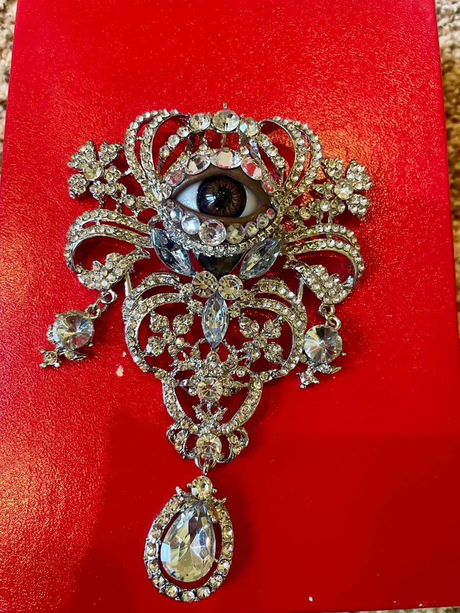 Very large glass eye broach