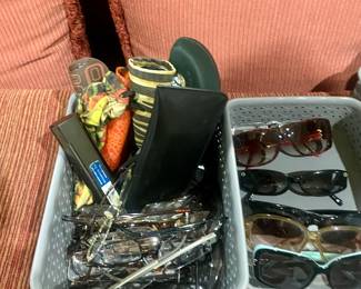 Lots of designer readers and sunglasses