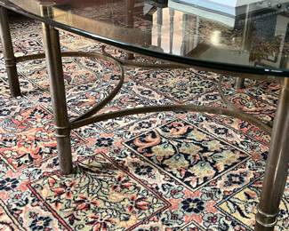 vintage brass and glass oval coffee table on beautiful rug - 9x12
