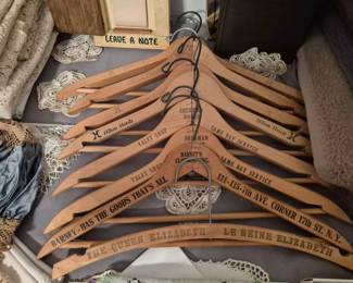 Some fun old wooden hangers with advertising. 