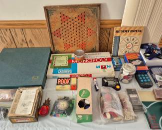The Scrabble game is the deluxe with the rotating board and red tiles.