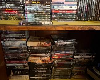 Large collection of DVDs, including British murder mysteries.