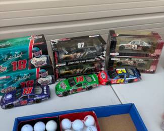 Die cast cars, golf balls