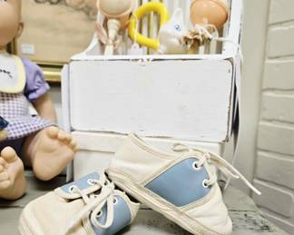 Saddle shoes for baby. Vintage rattles.