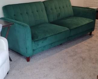 Green velvety sofa