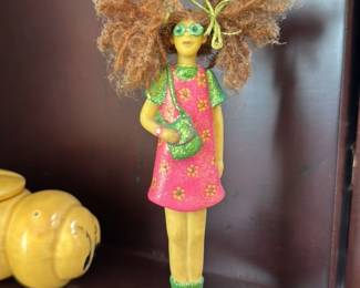 Whimsical Figurine of a Girl with Wild Hair 