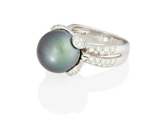157
An 18K White Gold, Colored Cultured Pearl and Diamond Ring
Centering a black cultured pearl measuring approximately 13.98 mm, accented by round diamonds weighing approximately 1.25 carats

Size: 7 1/2
13.2 grams gross
Estimate: $1,200 - $1,800