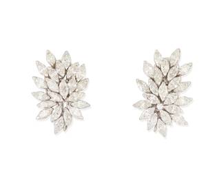 212
A Pair of 14K White Gold and Diamond Earrings
Of a floral design featuring marquise-shaped and a round diamond weighing approximately 5.35 carats
2 pieces

Measures: 1 x 1/2 in.
12.3 grams gross
Estimate: $2,000 - $3,000
