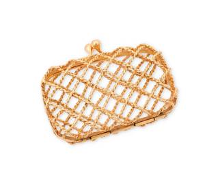 110
A Small Gold and Gem-Set Purse
Of a twisted gold lattice motif design, finished with a round sapphire and ruby on the clasp terminals

Measures: 2 3/8 x 1 3/4 x 3/4 in.
35.2 grams gross
Estimate: $1,500 - $2,500