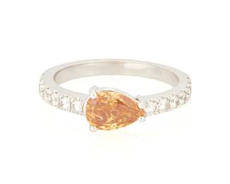 46
An 18K White Gold, Fancy Deep Yellowish Orange Diamond and Diamond Ring
Centering a pear modified brilliant-cut Fancy Deep Yellowish Orange diamond weighing 1.04 carat, accented by round diamonds weighing approximately 0.50 carat

Size: 7
3.6 grams gross

Accompanied by a GIA Report numbered #1146379606, dated October 25, 2012, stating the diamond as Natural with a color grade of Fancy Deep Yellowish Orange,
Estimate: $2,500 - $3,500
