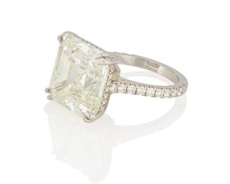 34
A Platinum and Diamond Ring
Centering a square emerald-cut diamond weighing 15.57 carats, accented by round diamonds

Size: 6 1/4
10.2 grams gross

Accompanied by a GIA Report numbered #2235034773, dated August 10, 2023, stating the diamond as Natural with a color grade of L and a clarity grade of VS1, no fluorescence, Excellent Polish and Excellent symmetry
Estimate: $175,000 - $250,000