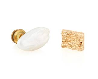100
Ruser: Two Gold and Pearl Tie Pins
One featuring a freshwater pearl, the other of a textured gold design, both signed Ruser

Measures: 3/4 in. and 1/2 in.
7.3 grams gross
Estimate: $400 - $600