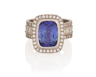 198
A Platinum, Tanzanite and Diamond Ring
Centering a rectangular cushion-cut tanzanite weighing approximately 4.45 carats, accented by round and princess-cut diamonds weighing approximately 3.00 carats

Size: 7
13.8 grams gross
Estimate: $2,000 - $3,000