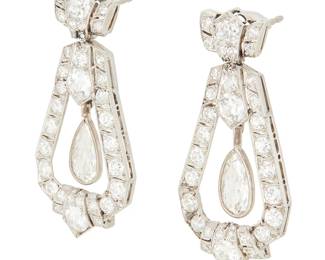 247
A Pair of Platinum and Diamond Earrings
Featuring a geometric style frame suspending two pear-shaped diamonds weighing approximately 1.07 carats each, accented by old European-cut and single-cut diamonds weighing approximately 4.40 carats total
2 pieces

Measures: 1 1/2 x 3/4 in.
11.5 grams gross
Estimate: $15,000 - $20,000

