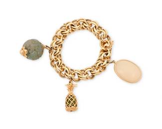 132
A 14K Gold and Hardstone Charm Bracelet
Suspending three charms, an oval white agate, a carved jade bead and a Hawaii pineapple featuring tumbled peridot

Length: 7 1/2 in.
89.6 grams gross
Estimate: $3,500 - $4,500