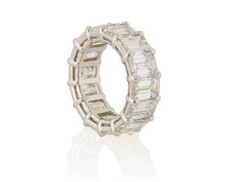 116
A Platinum and Diamond Eternity Band
Featuring fourteen emerald-cut diamonds weighing 14.24 carats

Size: 5 3/4
9.8 grams gross

Accompanied by 14 GIA reports stating that the diamond weight ranges from 1.00 - 1.04 carats, I - J color, IF - VS2 clarity.

Click Here to download and view the GIA certificates for this lot.
Estimate: $35,000 - $55,000