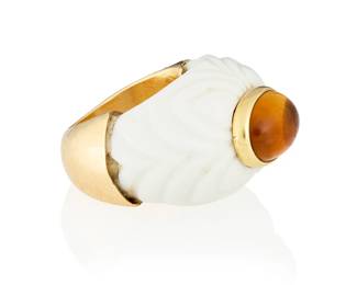 142
Bulgari: An 18K Gold and Citrine Ring
Centering an oval citrine cabochon measuring approximately 12.62 x 9.63 mm, set in a molded ceramic half shank, with an altered bottom shank of 18k gold, signed Bulgari with Italian assay marks

Size: 5 1/2
13.1 grams gross
Estimate: $600 - $800