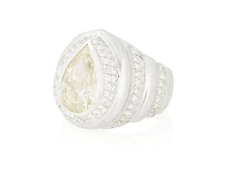 38
An 18K White Gold, Colored Diamond and Diamond Ring
Centering a pear-shaped yellow diamond weighing approximately 2.79 carats accented by rows of round diamonds weighing approximately 1.55 carats, with makers mark and French assay marks

Size: 5
7.9 grams gross
Estimate: $5,000 - $7,000