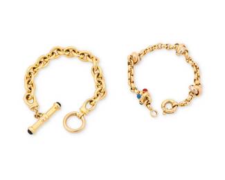 218
Two 14K Gold and Gem-Set Bracelets
Including one of oval links finished with a toggle clasp set with two round sapphire cabochons, together with a bracelet featuring bi-color gold links and a gold rondelles set with chalcedony and carnelian cabochons
2pieces

Measures: 7 1/2 in. and 8 in.
33.9 grams gross
Estimate: $1,500 - $2,500