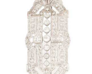 245
A Platinum and Diamond Brooch/Pendant
Of an ornate design featuring old European-cut and single-cut diamonds weighing approximately 4.35 carats

Measures: 3 x 1 1/2 in.
23.3 grams gross
Estimate: $1,800 - $2,500