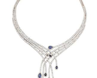 215
An 18K White Gold, Sapphire and Diamond Necklace
Of a cascading design featuring round diamonds weighing approximately 27.27 carats, with tendrils terminating in pear-shaped sapphires weighing approximately 4.00 carats

Length: 16 in., Tendrils: 3 in.
89.5 grams gross
Estimate: $18,000 - $25,000