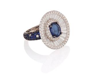 213
Jana: An 18K White Gold, Sapphire and Diamond Ring
Centering an oval sapphire weighing approximately 2.10 carats set in a concave mount encircled by round and tapered baguette diamonds weighing approximately 2.50 carats, finished with a half shank set with round sapphires and diamonds, signed Jana, no. 3435-3

Size: 7
10.0 grams gross
Estimate: $6,000 - $8,000