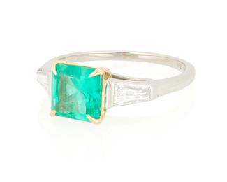 267
Tiffany & Co.: A Platinum, 18K Gold, Emerald and Diamond Ring
Centering an octagonal step-cut emerald weighing 2.12 carats, flanked by two tapered baguettes, signed Tiffany & Co., with signed box

Size: 7 1/2
4.12 grams gross

Accompanied by a GIA Report numbered #5232531836, dated March 24,2025, stating the Emerald as natural Beryl of Colombian origin with clarity enhancement (F1).
Estimate: $4,500 - $5,500