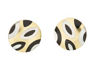 127
Asch Grossbardt: A Pair of 14K Gold, Onyx and Mother-of-Pearl Earclips
Featuring marquise-shaped inlay of onyx and mother-of-pearl, signed Grossbardt with makers mark, no. B28
2 pieces

Measures: 7/8 x 7/8 in.
13.8 grams gross
Estimate: $1,800 - $2,500