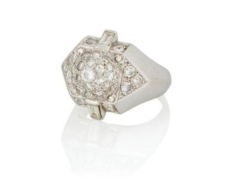216
Suzanne Belperron: A Platinum and Diamond Ring
Of a geometric design featuring a domed center accented by single-cut and baguette diamonds weighing approximately 1.70 carats, finished with a knife-edge shank, accompanied by a Certificate of Authenticity

Size: 6 3/4
11.3 grams gross
Estimate: $18,000 - $25,000
