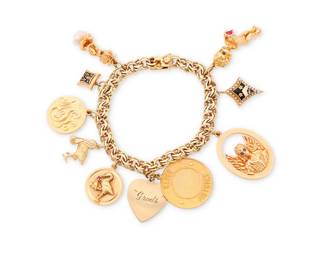 105
A Gold Charm Bracelet Featuring Ruser Charms
A 14k gold fancy link chain suspending six gold charms and four Ruser charms including an angel, a graduate, a small child with a heart and a round monogrammed token, with signed box

Length: 7 1/4 in.
72.7 grams gross
Estimate: $3,500 - $5,500