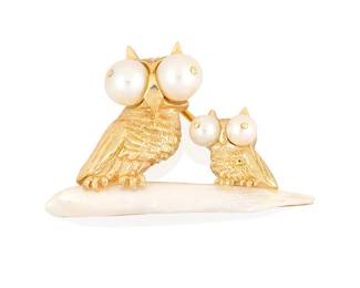87
Ruser: A 14K Gold and Freshwater Pearl Brooch
Featuring two owls atop a freshwater pearl branch featuring cultured pearl eyes, signed Ruser, with signed box

Measures: 1 5/8 x 1 1/8 in.
11.6 grams gross
Estimate: $800 - $1,200