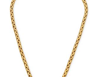 221
An 18K Gold Necklace
Of a braided design finished with a large round clasp, marked CIT

Length: 18 in.
47.1 grams gross
Estimate: $2,500 - $3,500