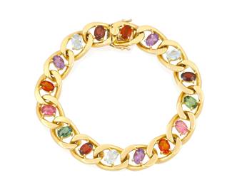 5
An 18K Gold and Gem-Set Bracelet
Featuring curb links centering oval amethyst, aquamarine, garnet, green tourmaline and pink tourmaline

Length: 6 3/4 in., Width: 3/8 in.
35.2 grams gross
Estimate: $3,500 - $5,500
