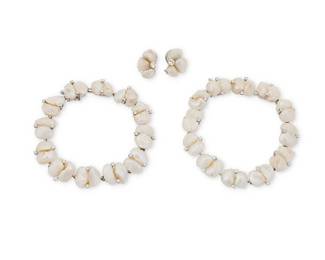 98
Ruser: An 18K White Gold, Platinum, Freshwater Pearl and Diamond Suite
Including two bracelets, that convert into a choker and a pair of earclips, all featuring baroque freshwater pearls and round diamonds
3 pieces

Bracelets: 7 in. (choker: 14 in.), Earrings: 5/8 x 3/.8 in.
64.8 grams gross
Estimate: $2,500 - $3,500